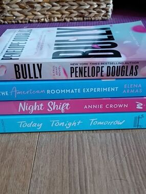 Stack of Four Contemporary Paperbacks in Pink and Teal